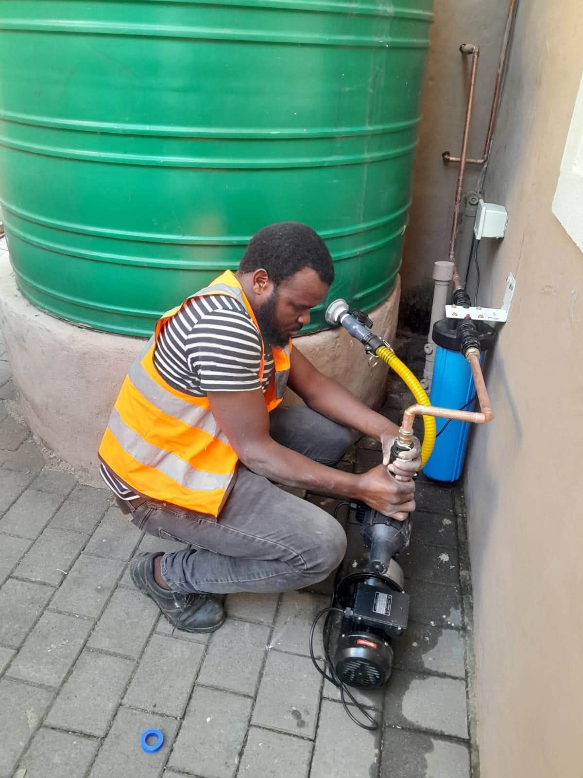 Water pump and tank plumbing
