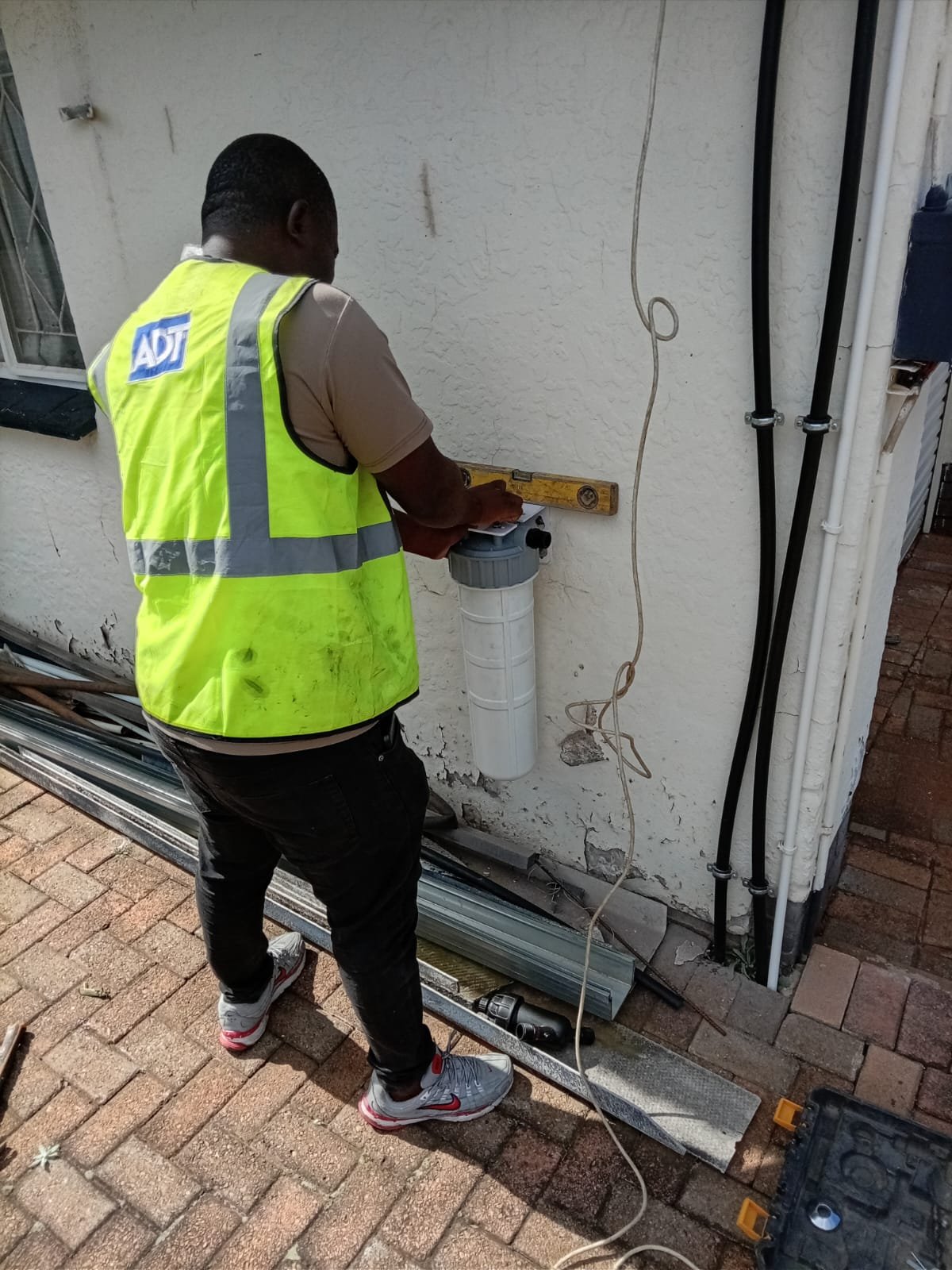 Outdoor water filtration and pump system installation